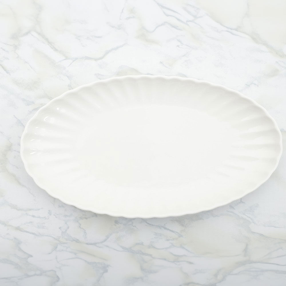 Plato Groove ovalado para servir de porcelana 32x18 cm